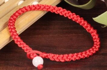 red string amulet